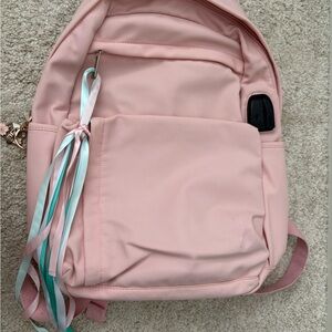 Pink Backpack with Ribbon Accents